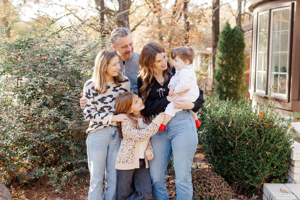 Unposed family moment captured by Arkansas family photographer Allison Maxwell