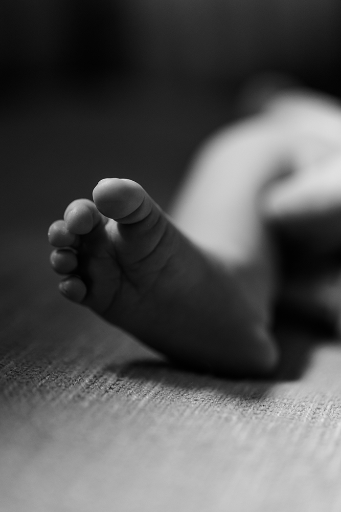 Natural, in-home newborn photos with Little Rock family photographer