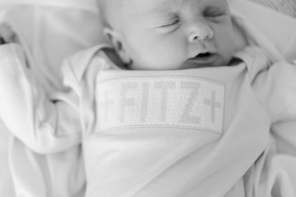 Black and white photo  newborn baby sleeping