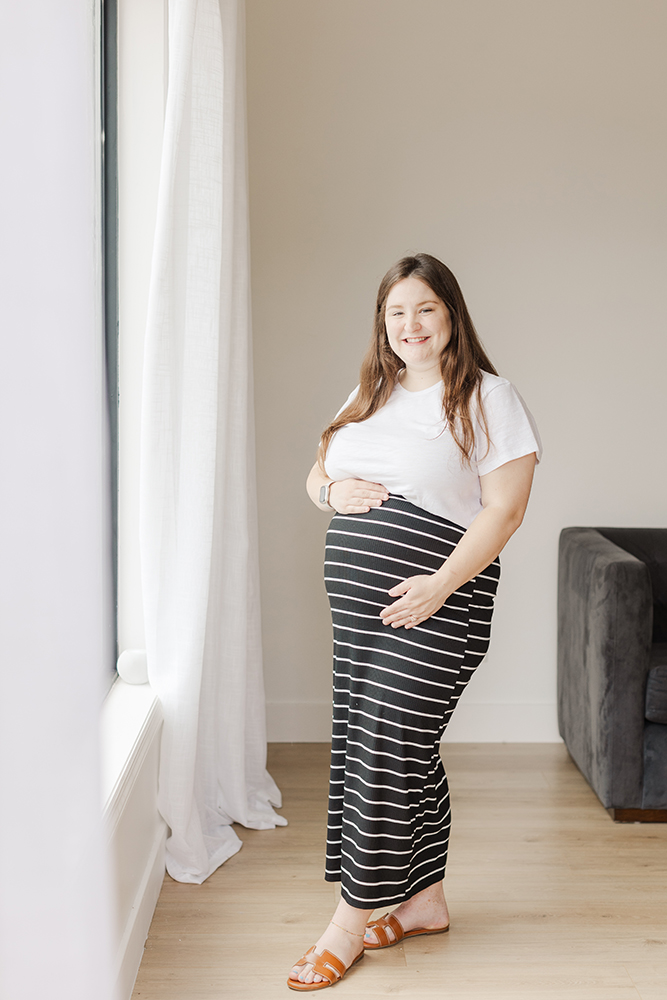 Studio maternity photo showcasing one of the best tips for beautiful maternity photos: keep it simple and timeless.