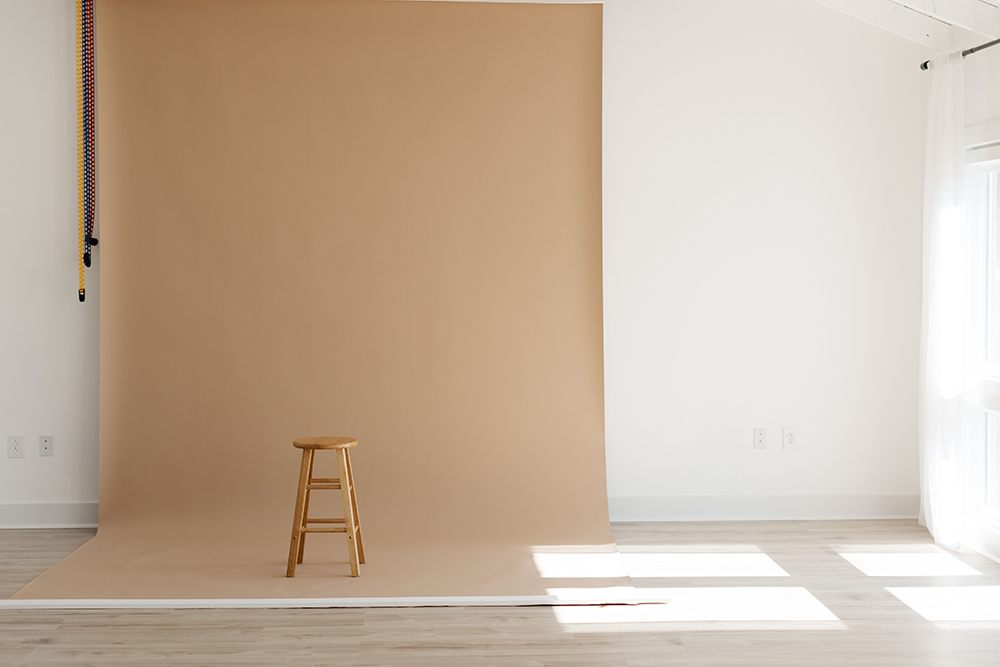 Maternity photography session in natural light studio