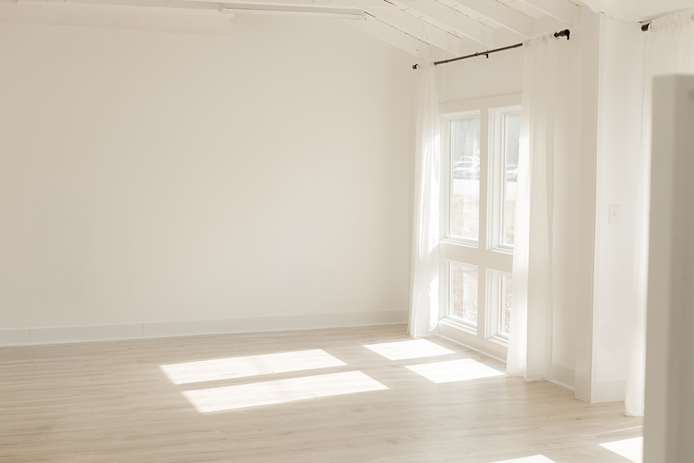 studio space with blank canvas photography space with white walls